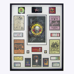 Framed concert tickets and music memorabilia