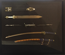 Swords framed in shadow box
