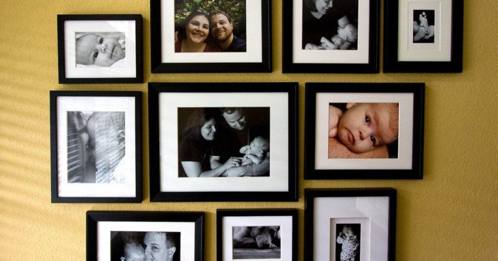 custom framing family photos on gallery wall