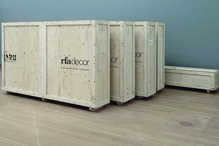 art being stored safely in crates